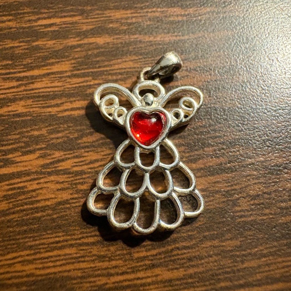 Avon Silver-Tone “Mary” Angel Pendant with Red Heart